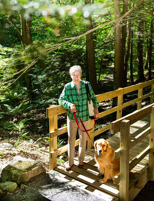 resident walking dog